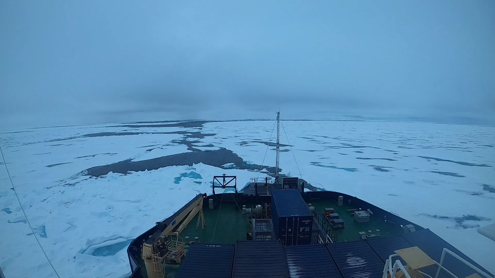 Polar Arctic Research with Kimberly Bird and Birthe front of the boat