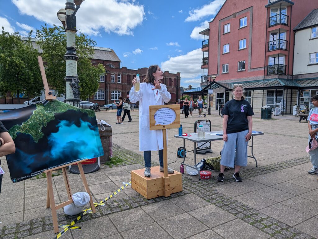 Katherine Helliwell and Susie Wharam presenting at Soapbox Science in Exeter Quayside